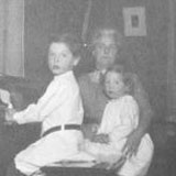 Virginia Apgar, her brother Lawrence, and her mother at home, ca. 1912