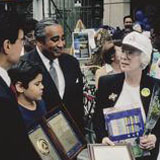 Barbara Barlow with Congressman Charles B. Rangel (NY) receiving the United States Department of Transportation Safe Community Award, 1996