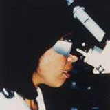 Patricia E. Bath, M.D. inserting fiber optic into human eye, testing fragment, performing cataract surgery on human eyeball at the Laser Medical Center, Berlin West Germany, 1986