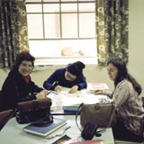 Ruth Dayhoff (right) studying with medical school classmates Yolanda Stassinopoulos (left) and Alice Duong(middle) in the cafeteria at Georgetown University Medical School, 1974