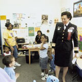 Acting Surgeon General Audrey Forbes Manley in daycare center, ca. 1996