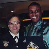 Acting Surgeon General Audrey Forbes Manley with Olympian Carl Lewis at a fund raising event, ca. 1996