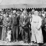 Susan La Flesche Picotte with members of the Omaha Nation on the reservation, 1910