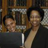 Joan Y. Reede with Annette Claudio of Martin Luther King Middle School at a "Mentoring for Science" awards dinner, 2002