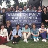 Michelle Bholat with the Wilmington Family Health Center staff, 1999
