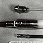 Three instruments: oval shaped 
connected to a tube, wide long pointed shape connected to a tube, narrow shape connected to a tube.