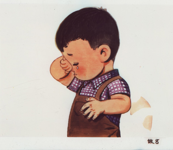 Slide showing a little boy, in brown overalls and checkered shirt, wiping his eyes as he cries