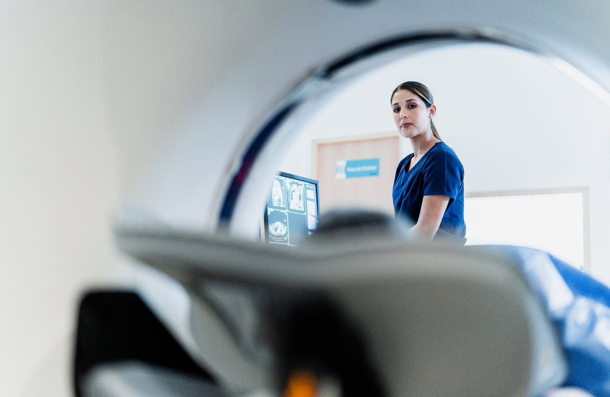 MRI machine showing medical professional